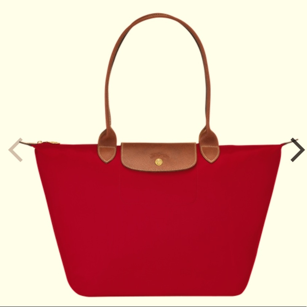 Longchamp “Le Pliage” large, red tote bag.